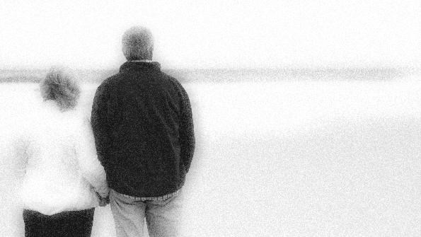 couple standing on a beach