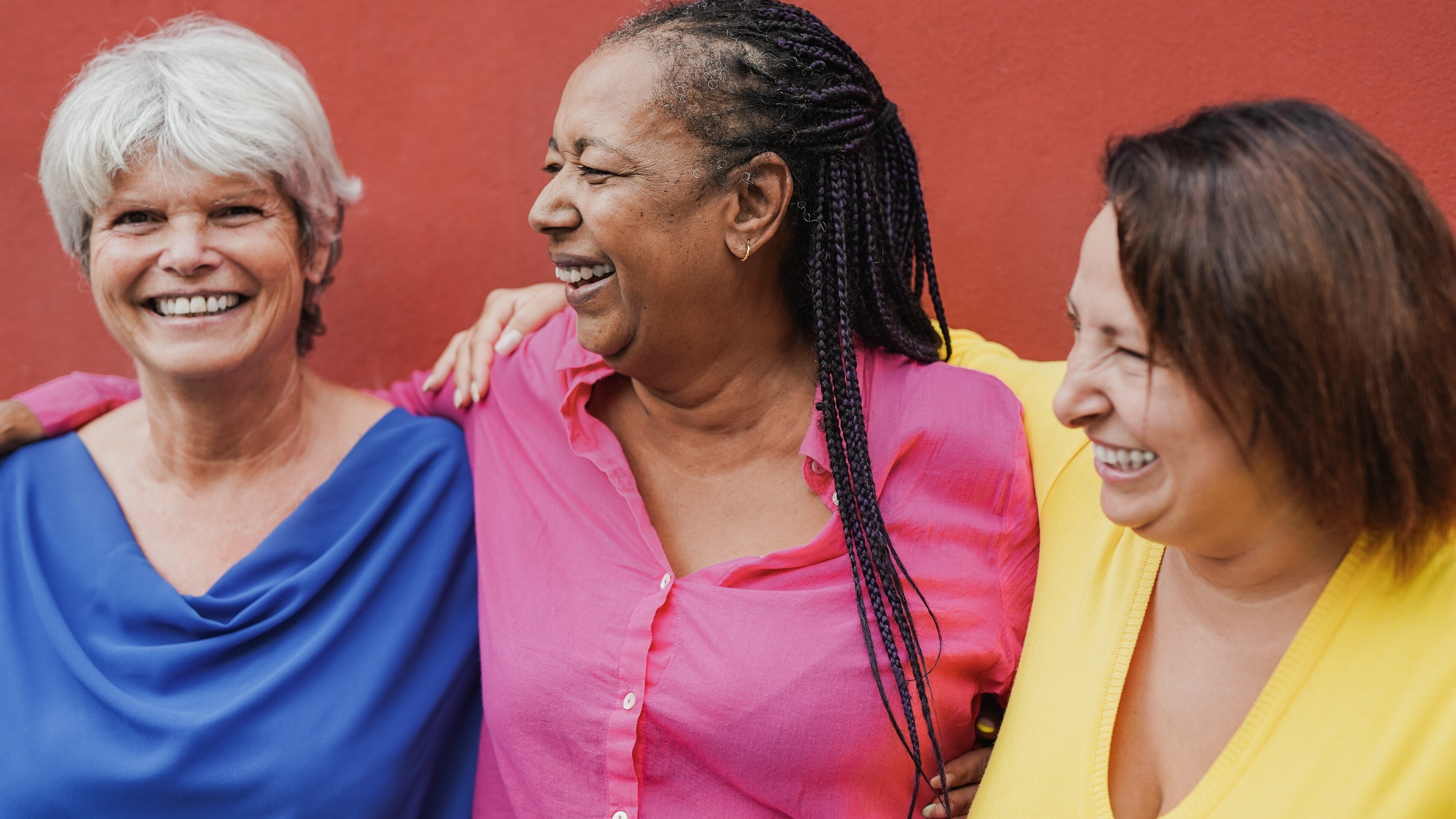 three smiling women
